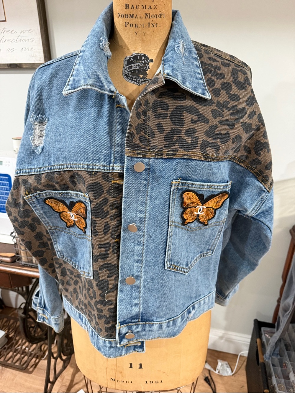 Blue Denim Jacket with Brown Leopard Panels and Orange Butterfly Patches